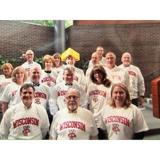 A group of people wearing matching shirts Description automatically generated